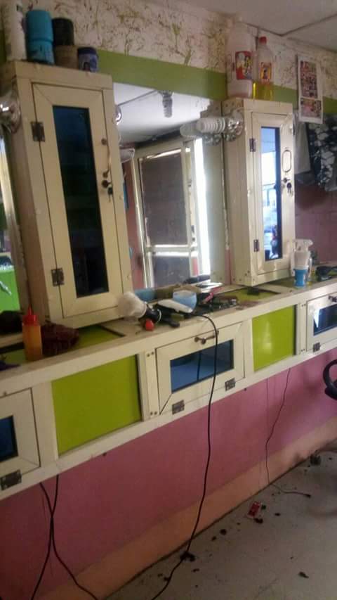Aluminium shop partition installation for haircut studio by ServoraPrise in Nigeria