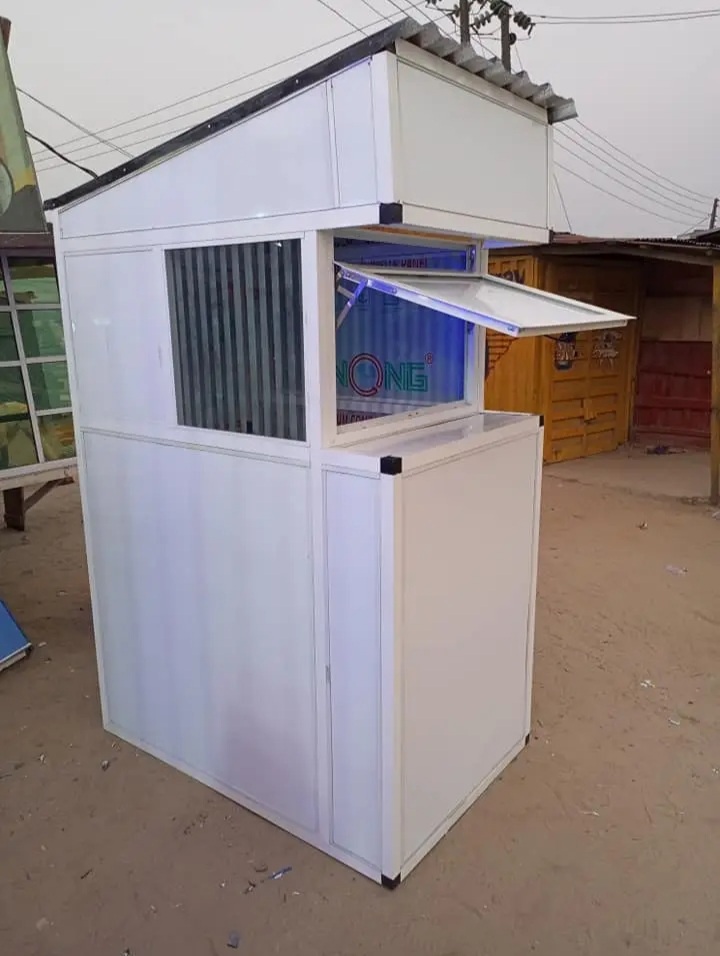 White-themed POS outlet interior design by ServoraPrise in Nigeria